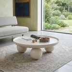 SCULPTURAL LOW PROFILE ROUND COFFEE TABLE
